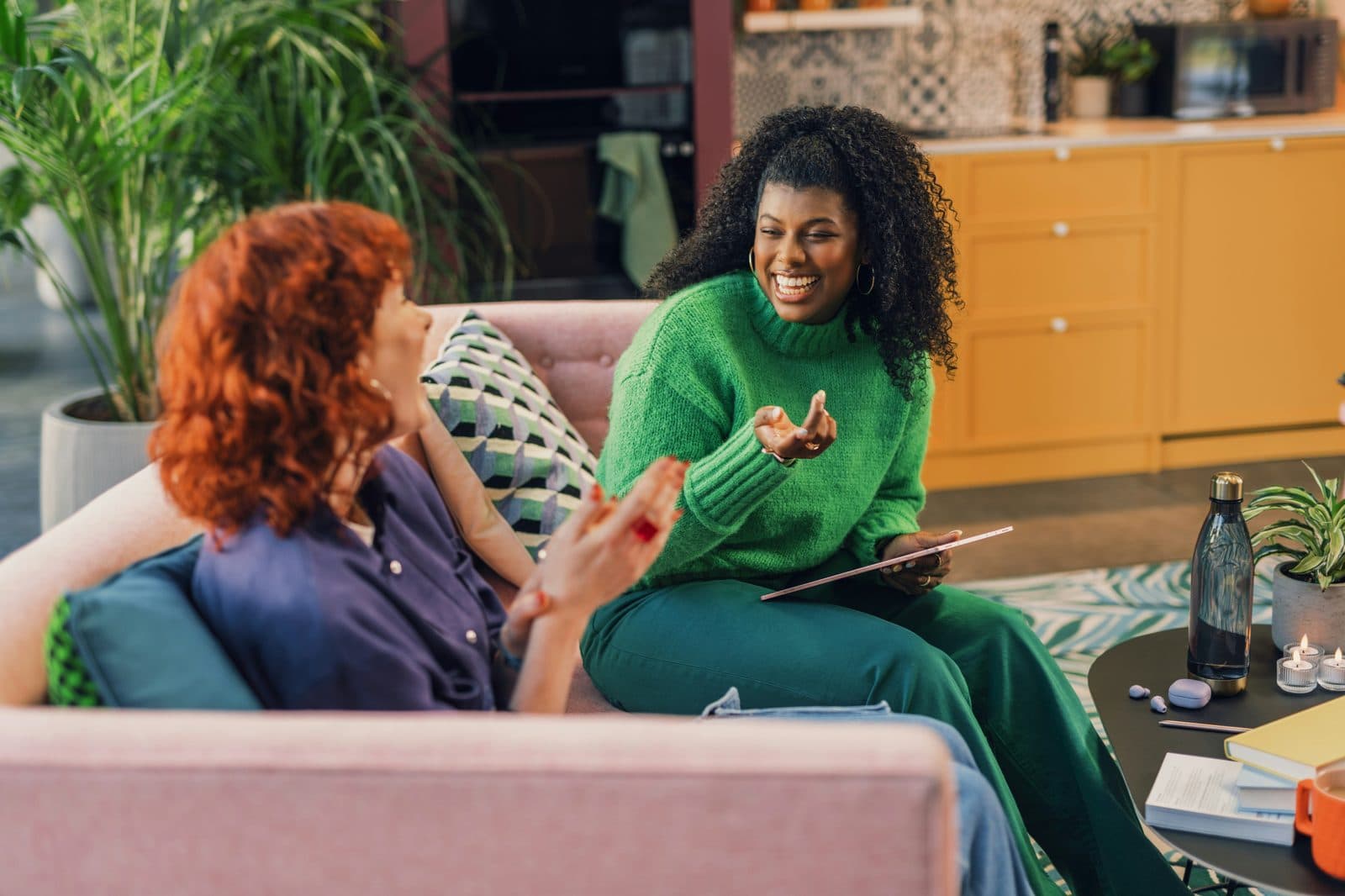 Two women in a warm, supportive conversation with a therapist